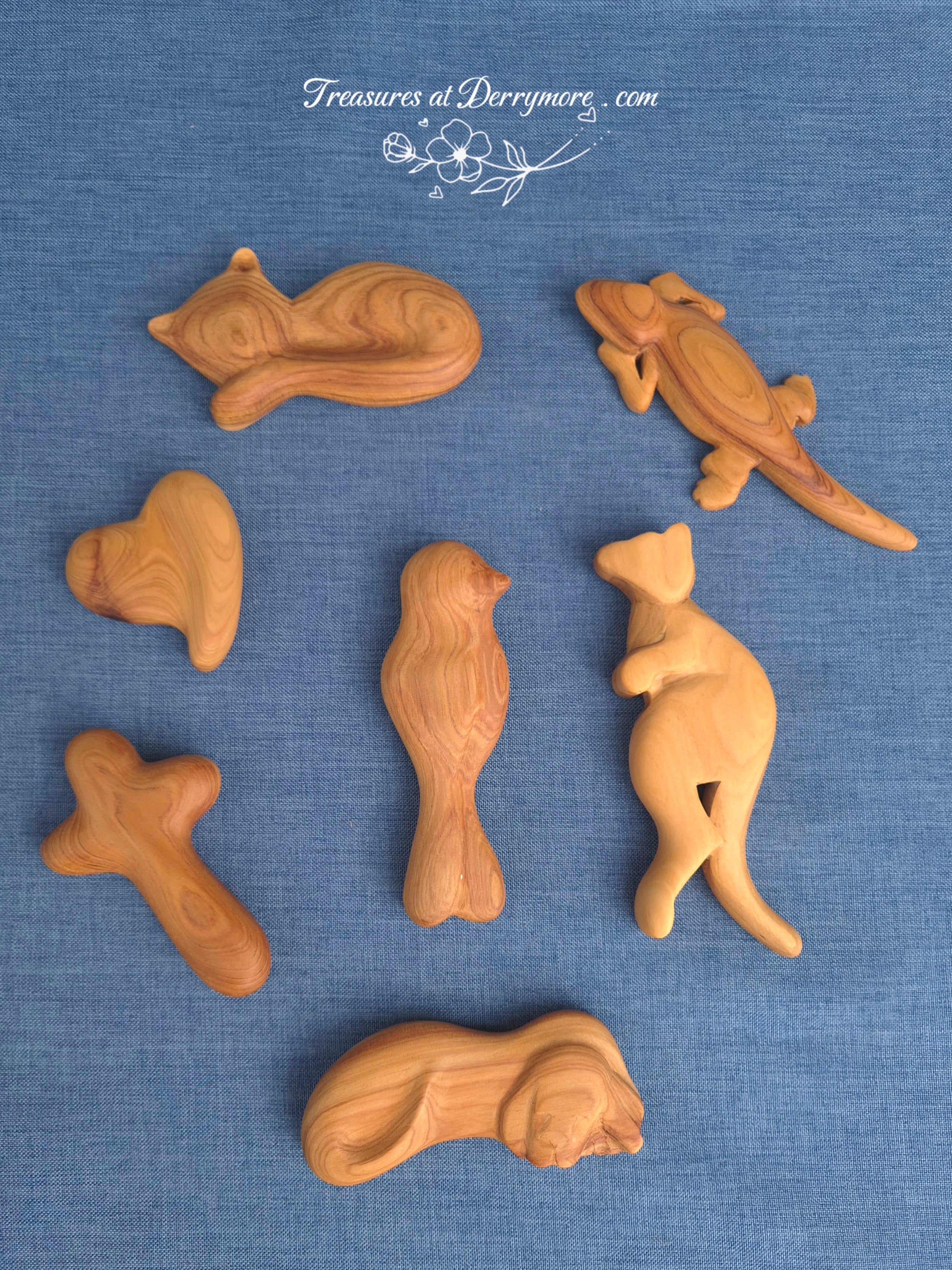 Collection of hand carved & individually shaped comfort pieces.
Dog, kangaroo, cross, bird, heart, cat, bearded dragon 