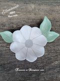 Hand carved and painted white flower shaped dish with green carved leaves