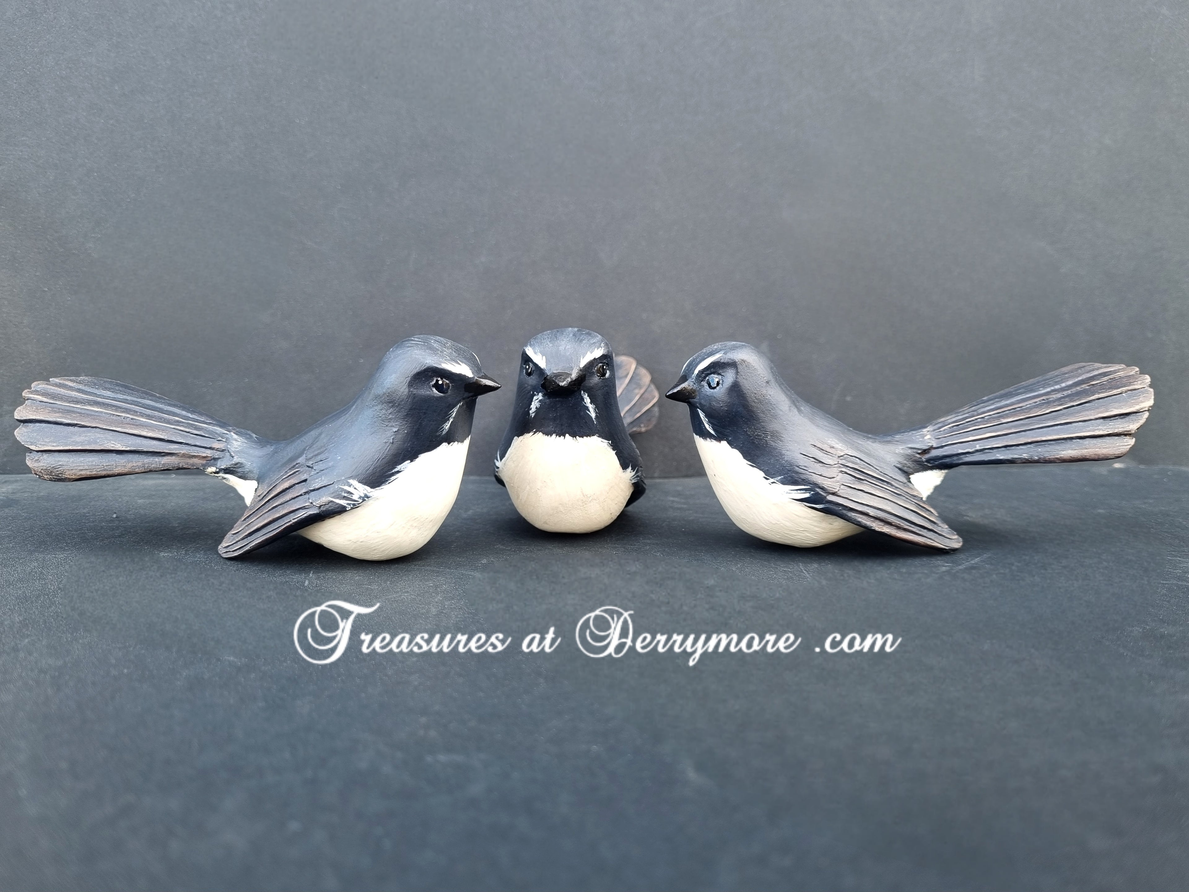 Hand carved Williewagtail sculptures. Black & white Australian bird. Detailed feather carving on wings & tail. 